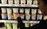 Illustrative: A shopper picks out General Mill's Haagen-Dazs ice cream at a grocery store in Palo Alto, California, June 28, 2011. (AP Photo/Paul Sakuma)