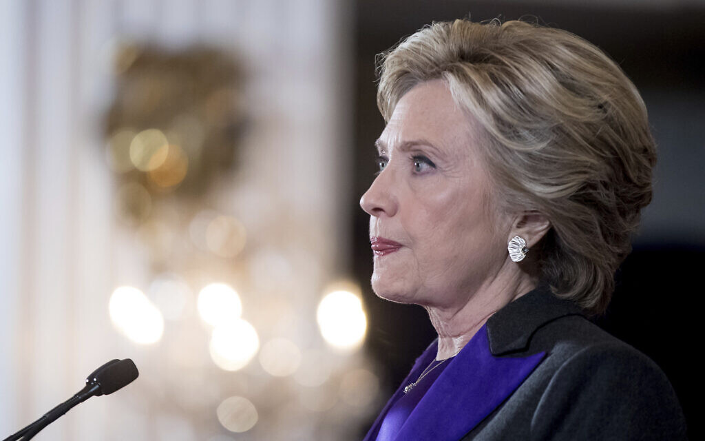 FILE - In this Nov. 9, 2016, file photo, Hillary Clinton pauses while delivering a speech conceding her defeat to Republican Donald Trump after the hard-fought presidential election. The AP reported on Nov.
10, 2017, that an article claiming Clinton didn't give a concession speech was false. (AP Photo/Andrew Harnik, File) FILE - In this Nov. 9, 2016, file photo, Hillary Clinton pauses while delivering a speech conceding her defeat to Republican Donald Trump after the hard-fought presidential election. The AP reported on Nov.
10, 2017, that an article claiming Clinton didn't give a concession speech was false. (AP Photo/Andrew Harnik, File)