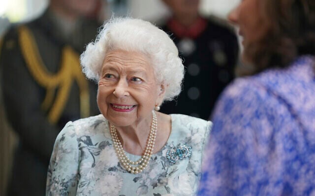 Queen Elizabeth II looks on during a visit to officially open the new building at Thames Hospice, Maidenhead, Berkshire, July 15, 2022. (Kirsty O'Connor/Pool Photo via AP)