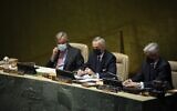 United Nations Secretary-General Antonio Guterres, left, and Ambassador Gustavo Zlauvinen, center, are seen during the 2022 Nuclear Non-Proliferation Treaty (NPT) review conference, in the United Nations General Assembly, Monday, August 1, 2022. (AP Photo/Yuki Iwamura)