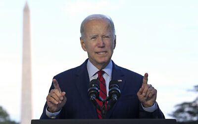 US President Joe Biden speaks from the Blue Room Balcony of the White House August 1, 2022, in Washington, as he announces that a US airstrike killed al-Qaeda leader Ayman al-Zawahiri in Afghanistan. (Jim Watson/Pool via AP)