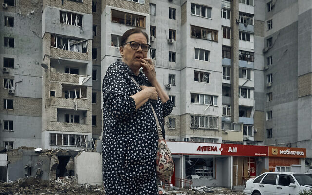 A woman stands in the aftermath of the Russian shelling in Mykolaiv, Ukraine, Aug. 3, 2022 (AP Photo/Kostiantyn Liberov) A woman stands in the aftermath of the Russian shelling in Mykolaiv, Ukraine, Aug. 3, 2022 (AP Photo/Kostiantyn Liberov)