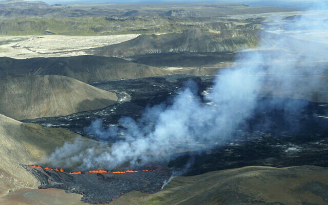 A aerial shot of activity from the Fagradalsfjall volcano in Iceland on Wednesday Aug. 3, 2022, which is located 32 kilometers (20 miles) southwest of the capital of Reykjavik and close to the international Keflavik Airport. Authorities in Iceland say a volcano in the southwest of the country is erupting just eight months after its last eruption officially ended. (AP Photo/Ernir Snær) A aerial shot of activity from the Fagradalsfjall volcano in Iceland on Wednesday Aug. 3, 2022, which is located 32 kilometers (20 miles) southwest of the capital of Reykjavik and close to the international Keflavik Airport. Authorities in Iceland say a volcano in the southwest of the country is erupting just eight months after its last eruption officially ended. (AP Photo/Ernir Snær)