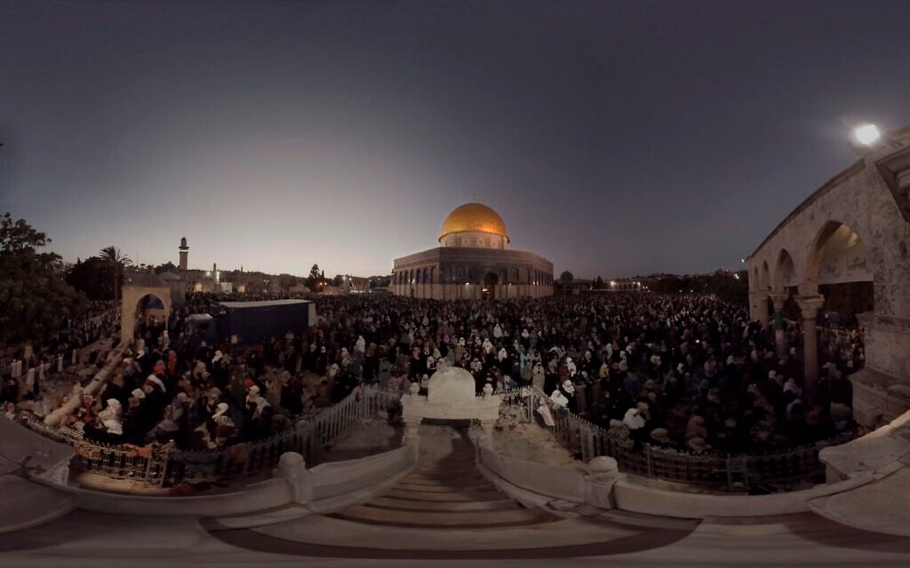 This July 22, 2019, photo taken from video gives a 360-degree view of Ramadan prayers on the plateau of the Dome of the Rock, which can be seen in The Holy City, a virtual reality experience in the metaverse. (The Holy City VR via AP) This July 22, 2019, photo taken from video gives a 360-degree view of Ramadan prayers on the plateau of the Dome of the Rock, which can be seen in The Holy City, a virtual reality experience in the metaverse. (The Holy City VR via AP)