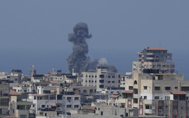 Smoke rises after an Israeli air strike in Gaza City on August 6, 2022. Israel has been carrying out strikes on terror targets in the enclave as rockets are fired toward Israeli communities (AP Photo/Hatem Moussa) Smoke rises after an Israeli air strike in Gaza City on August 6, 2022. Israel has been carrying out strikes on terror targets in the enclave as rockets are fired toward Israeli communities (AP Photo/Hatem Moussa)