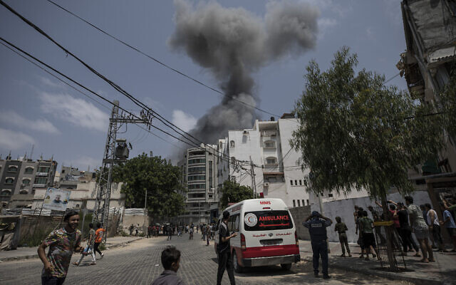 Smoke rises after Israeli airstrikes on a building, in Gaza City, August 6, 2022. The Israel Defense Forces says it is carrying out strikes on terror targets as barrages of rockets are fired at Israeli towns. (AP Photo/Fatima Shbair) Smoke rises after Israeli airstrikes on a building, in Gaza City, August 6, 2022. The Israel Defense Forces says it is carrying out strikes on terror targets as barrages of rockets are fired at Israeli towns. (AP Photo/Fatima Shbair)