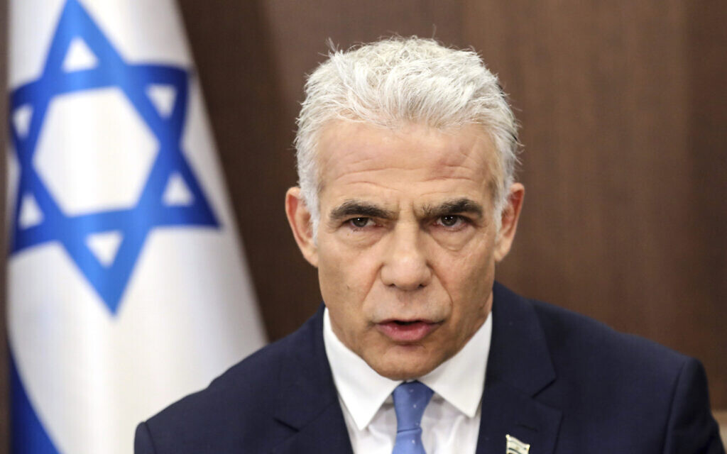 Prime Minister Yair Lapid heads a cabinet meeting in Jerusalem on July 31, 2022. (Gil Cohen-Magen/Pool Photo via AP) Prime Minister Yair Lapid heads a cabinet meeting in Jerusalem on July 31, 2022. (Gil Cohen-Magen/Pool Photo via AP)