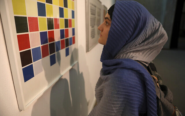A visitor looks at artworks by the American artist Sol Lewitt while visiting a 19th- and 20th-century American and European minimalist and conceptual masterpieces show at the Tehran Museum of Contemporary Art in Tehran, Iran, Aug. 2, 2022. (Vahid Salemi/AP) A visitor looks at artworks by the American artist Sol Lewitt while visiting a 19th- and 20th-century American and European minimalist and conceptual masterpieces show at the Tehran Museum of Contemporary Art in Tehran, Iran, Aug. 2, 2022. (Vahid Salemi/AP)
