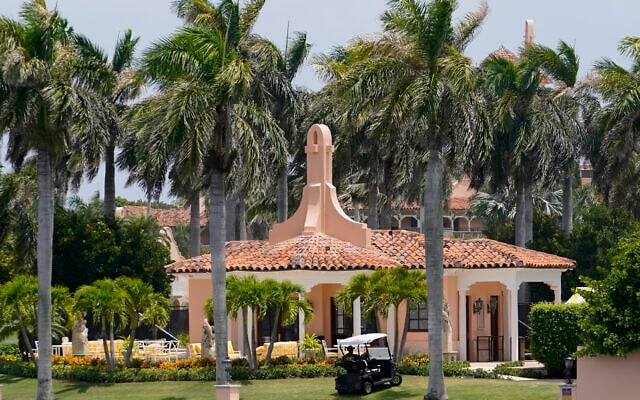 Security moves in a golf cart at former president Donald Trump's Mar-a-Lago estate, August 9, 2022, in Palm Beach, Florida. (AP Photo/Lynne Sladky) Security moves in a golf cart at former president Donald Trump's Mar-a-Lago estate, August 9, 2022, in Palm Beach, Florida. (AP Photo/Lynne Sladky)