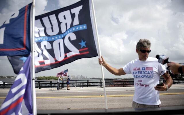 Supporters of Donald Trump, members of the media and law enforcement gather near Mar-a-Lago in Palm Beach, Florida, on Tuesday, August 9, 2022. (Meghan McCarthy/The Palm Beach Post via AP) Supporters of Donald Trump, members of the media and law enforcement gather near Mar-a-Lago in Palm Beach, Florida, on Tuesday, August 9, 2022. (Meghan McCarthy/The Palm Beach Post via AP)