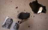 Drawings by Duniana al-Amour are seen in her damaged bedroom which was hit by an Israeli strike, east of Khan Younis, in the southern Gaza Strip, seen Aug. 10, 2022. (Fatima Shbair/AP)