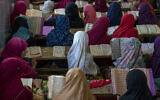 Afghan girls read the Quran in the Noor Mosque outside the city of Kabul, Afghanistan, August 3 2022. (AP/Ebrahim Noroozi)