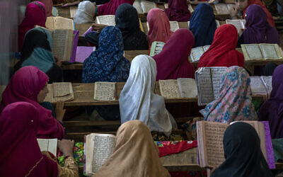 Afghan girls read the Quran in the Noor Mosque outside the city of Kabul, Afghanistan, August 3 2022. (AP/Ebrahim Noroozi)