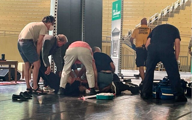 Author Salman Rushdie is tended to after he was attacked during a lecture, Friday, Aug. 12, 2022, at the Chautauqua Institution in Chautauqua, N.Y., about 75 miles (120 km) south of Buffalo. (AP Photo/Joshua Goodman) Author Salman Rushdie is tended to after he was attacked during a lecture, Friday, Aug. 12, 2022, at the Chautauqua Institution in Chautauqua, N.Y., about 75 miles (120 km) south of Buffalo. (AP Photo/Joshua Goodman)