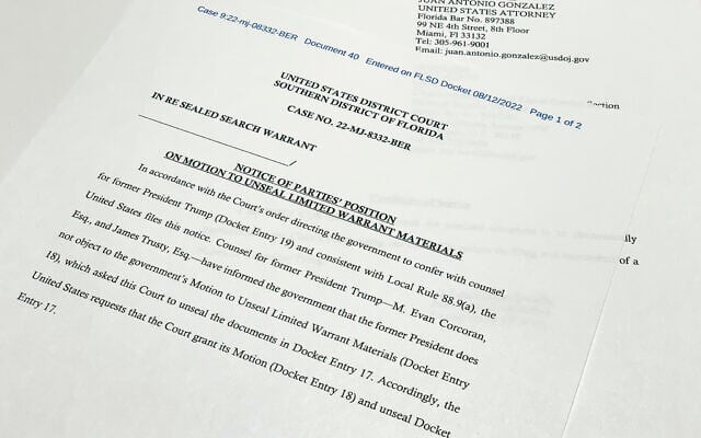 The notice filed by the Justice Department to the US District Court South District of Florida informing the judge that lawyers for former President Donald Trump did not object to the government's motion to unseal the search warrant for Trump's Mar-a-Lago estate, is photographed Friday, August 12, 2022. (AP Photo/Jon Elswick) The notice filed by the Justice Department to the US District Court South District of Florida informing the judge that lawyers for former President Donald Trump did not object to the government's motion to unseal the search warrant for Trump's Mar-a-Lago estate, is photographed Friday, August 12, 2022. (AP Photo/Jon Elswick)