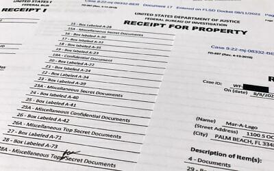 The receipt for property that was seized during the execution of a search warrant by the FBI at former US president Donald Trump's Mar-a-Lago estate in Palm Beach, Florida, photographed on Aug. 12, 2022. (Jon Elswick/AP)