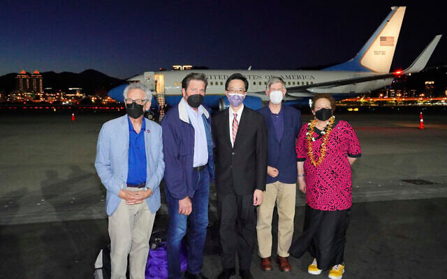 From the left, US Democratic House member Alan Lowenthal from California, Democratic House member John Garamendi, Donald Yu-Tien Hsu, Director-General of the Department of North American Affairs at Taiwan's Foreign Affairs Ministry, Democratic House member Don Beyer from Virginia and Republican Congressman Aumua Amata Coleman Radewagen, a delegate from American Samoa pose for a photo after arriving on a US government plane at Songshan airport in Taipei, Taiwan, August 14, 2022. (Taiwan Ministry of Foreign Affairs via AP) From the left, US Democratic House member Alan Lowenthal from California, Democratic House member John Garamendi, Donald Yu-Tien Hsu, Director-General of the Department of North American Affairs at Taiwan's Foreign Affairs Ministry, Democratic House member Don Beyer from Virginia and Republican Congressman Aumua Amata Coleman Radewagen, a delegate from American Samoa pose for a photo after arriving on a US government plane at Songshan airport in Taipei, Taiwan, August 14, 2022. (Taiwan Ministry of Foreign Affairs via AP)