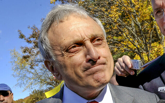 Carl Paladino listens during a media briefing, Oct. 31, 2010, in Old Bethpage, N.Y. (AP Photo/Kathy Kmonicek)