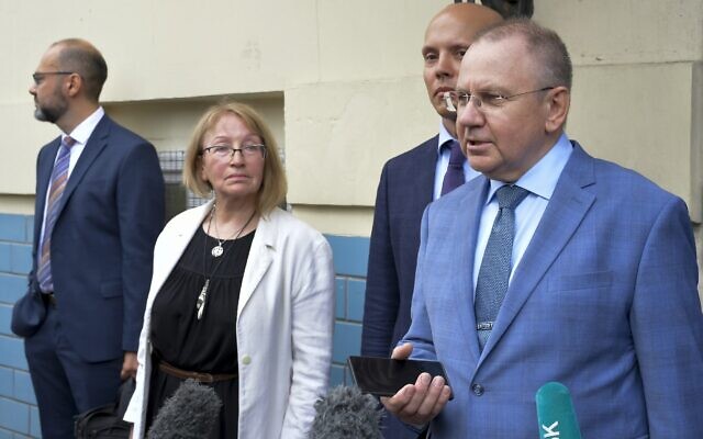 The Jewish Agency's lawyer, Andrei Grishayev, foreground right, and his colleagues speak to journalists after attending a hearing in the trial of the Russian Justice Ministry's request to shutter the organization in the Basmany District Court in Moscow, Russia, on August 19, 2022. (AP Photo) The Jewish Agency's lawyer, Andrei Grishayev, foreground right, and his colleagues speak to journalists after attending a hearing in the trial of the Russian Justice Ministry's request to shutter the organization in the Basmany District Court in Moscow, Russia, on August 19, 2022. (AP Photo)