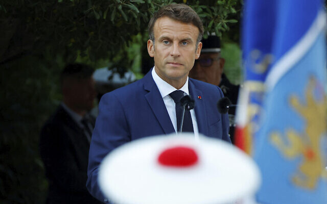 French President Emmanuel Macron attends a ceremony marking the 78th anniversary of the Allied landings in Provence during World War II, which helped liberate southern France, in Bormes-les-Mimosas, August 19, 2022. (Eric Gaillard, Pool via AP) French President Emmanuel Macron attends a ceremony marking the 78th anniversary of the Allied landings in Provence during World War II, which helped liberate southern France, in Bormes-les-Mimosas, August 19, 2022. (Eric Gaillard, Pool via AP)