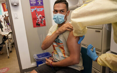 A patient is inoculated with the monkeypox vaccine at the OASIS Wellness Center, Aug. 19, 2022, in New York. (AP/Mary Altaffer)