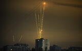 Russian rockets launch against Ukraine from Russia's Belgorod region are seen at dawn in Kharkiv, Ukraine, early Saturday, August 20, 2022. (AP/Vadim Belikov)