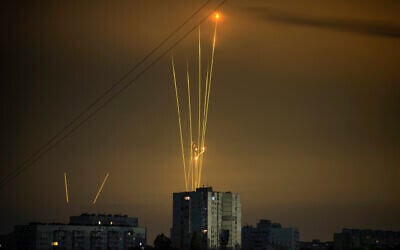 Russian rockets launch against Ukraine from Russia's Belgorod region are seen at dawn in Kharkiv, Ukraine, early Saturday, August 20, 2022. (AP/Vadim Belikov)