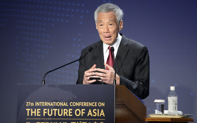 Singapore Prime Minster Lee Hsien Loong delivers a speech at a session of the International Conference on 'The Future of Asia,' in Tokyo, May 26, 2022. (AP Photo/Eugene Hoshiko, file) Singapore Prime Minster Lee Hsien Loong delivers a speech at a session of the International Conference on 'The Future of Asia,' in Tokyo, May 26, 2022. (AP Photo/Eugene Hoshiko, file)