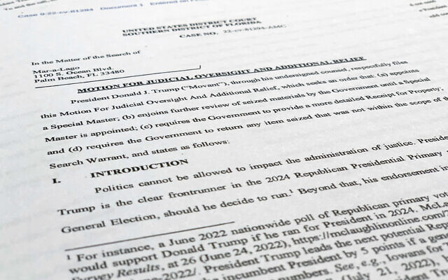 A court filing by lawyers for former US president Donald Trump is photographed on August 22, 2022, as lawyers ask a federal judge to prevent the FBI from continuing to review documents recovered from his Florida estate until a neutral special master can be appointed. (AP Photo/Jon Elswick) A court filing by lawyers for former US president Donald Trump is photographed on August 22, 2022, as lawyers ask a federal judge to prevent the FBI from continuing to review documents recovered from his Florida estate until a neutral special master can be appointed. (AP Photo/Jon Elswick)