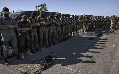 PalestinianIslamic Jihad fighters pray during an anti-Israel rally in Rafah, south of Gaza City, August 24, 2022. (Fatima Shbair/AP) PalestinianIslamic Jihad fighters pray during an anti-Israel rally in Rafah, south of Gaza City, August 24, 2022. (Fatima Shbair/AP)