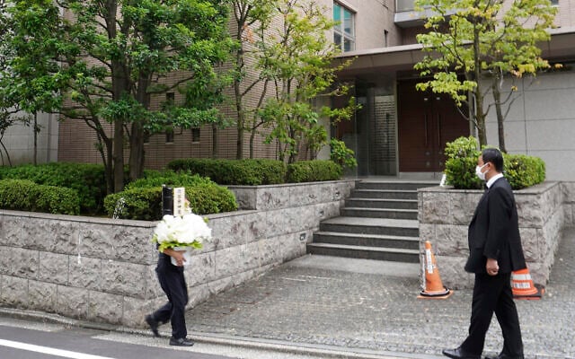 Flowers arrive at the residence of former Prime Minister Shinzo Abe in Tokyo Aug. 25, 2022. (Kyodo News via AP) Flowers arrive at the residence of former Prime Minister Shinzo Abe in Tokyo Aug. 25, 2022. (Kyodo News via AP)