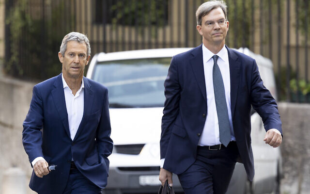 Israeli diamond magnate Beny Steinmetz, left, with his lawyer Daniel Kinzer arrives at a courthouse in Geneva, Switzerland, August 29, 2022. (Salvatore Di Nolfi/Keystone via AP) Israeli diamond magnate Beny Steinmetz, left, with his lawyer Daniel Kinzer arrives at a courthouse in Geneva, Switzerland, August 29, 2022. (Salvatore Di Nolfi/Keystone via AP)