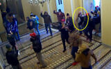 This image from US Capitol Police security video and contained in the government's sentencing memorandum for Joshua Pruitt, circled in yellow by source, shows him entering the U.S. Capitol in Washington, on Jan. 6, 2021. (Department of Justice via AP)