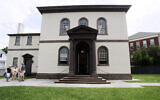 In this July 30, 2009 file photo, visitors stand outside the Touro Synagogue, in Newport, R.I., the oldest existing Jewish house of worship in the United States. (AP/Eric J. Shelton)