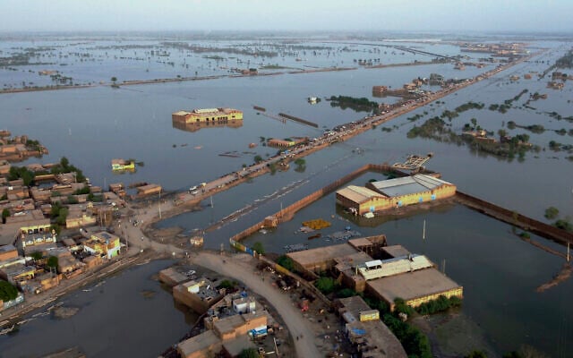 Homes are surrounded by floodwaters in Sohbat Pur city, a district of Pakistan's southwestern Baluchistan province, Aug. 29, 2022. (Zahid Hussain/AP) Homes are surrounded by floodwaters in Sohbat Pur city, a district of Pakistan's southwestern Baluchistan province, Aug. 29, 2022. (Zahid Hussain/AP)