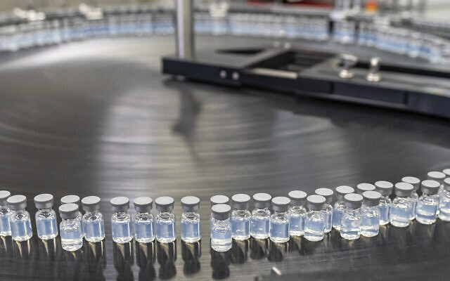 This August 2022 photo provided by Pfizer shows vials of the company's updated COVID-19 vaccine during production in Kalamazoo, Michigan. (Pfizer via AP) This August 2022 photo provided by Pfizer shows vials of the company's updated COVID-19 vaccine during production in Kalamazoo, Michigan. (Pfizer via AP)