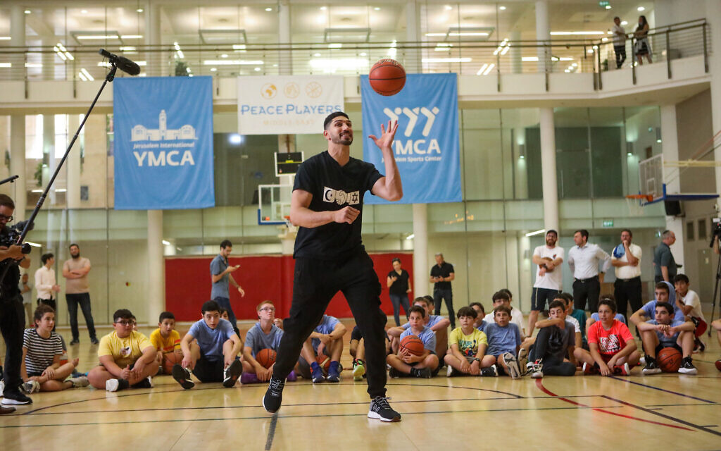 Enes Kanter Freedom leads at a basketball camp in Jerusalem's YMCA, July 31, 2022. (SoulShop Studios) Enes Kanter Freedom leads at a basketball camp in Jerusalem's YMCA, July 31, 2022. (SoulShop Studios)