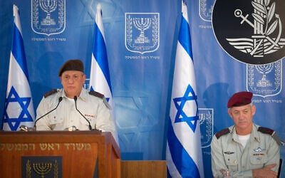 Illustrative: Then-incoming IDF chief of staff Gadi Eizenkot (L) and then-outgoing IDF Chief of Staff Benny Gantz (L) seen at a changing of the ranks ceremony held at the PM's office in Jerusalem, on February 16, 2015. (Miriam Alster/FLASH90)