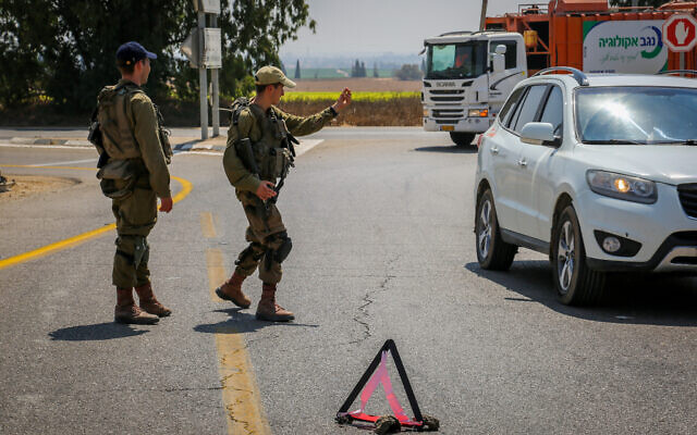 Israeli soldiers block roads near the border with the Gaza Strip on August 2, 2022. (Flash90) Israeli soldiers block roads near the border with the Gaza Strip on August 2, 2022. (Flash90)