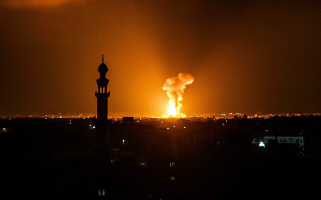 A ball of fire and smoke rises after Israeli airstrikes in Khan Younis, in the Gaza Strip, on August 5, 2022.  (Abed Rahim Khatib/Flash90)
