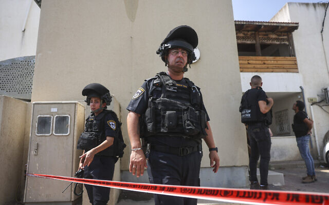 Security forces at a home in Sderot that sustained a direct hit from a rocket, August 6, 2022. (Yonatan Sindel/Flash90) Security forces at a home in Sderot that sustained a direct hit from a rocket, August 6, 2022. (Yonatan Sindel/Flash90)