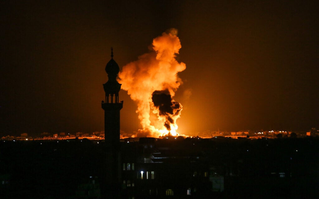 A ball of fire and smoke rise during Israeli airstrikes in Khan Younis, in the Gaza Strip, August 7, 2022. (Abed Rahim Khatib/Flash90)