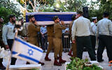 Family and friends attend the funeral of IDF soldier Nathan Fitoussi, who was killed by friendly fire near the West Bank city of Tulkarem, August 16, 2022. (Avshalom Sassoni/Flash90)