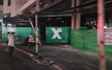 A bus crashed into a building that is still under construction on Yirmiyahu Street in Jerusalem, killing one person and injuring two including the driver, August 9, 2022. (Courtesy)