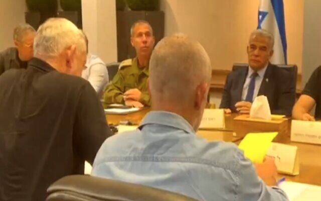 Prime Minister Yair Lapid, Defense Minister Benny Gantz and other ministers and officials hold a security consultation on August 5, 2022 at IDF headquarters in Tel Aviv. (Channel 12 screenshot) Prime Minister Yair Lapid, Defense Minister Benny Gantz and other ministers and officials hold a security consultation on August 5, 2022 at IDF headquarters in Tel Aviv. (Channel 12 screenshot)