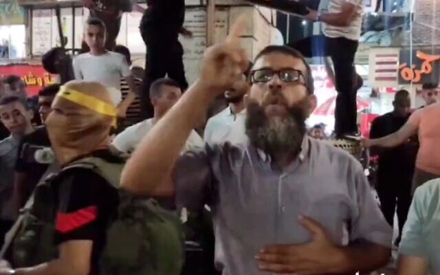 Palestinian Islamic Jihad members in the northern West Bank city of Jenin hold a rally in solidarity with their fellow fighters in Gaza on August 5, 2022. (Screen capture/Twitter) Palestinian Islamic Jihad members in the northern West Bank city of Jenin hold a rally in solidarity with their fellow fighters in Gaza on August 5, 2022. (Screen capture/Twitter)
