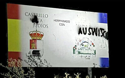 A sign in Castrillo Mota de Judíos, Spain, was found vandalized with antisemitic spray paint, August 3, 2022. (Courtesy/Lorenzo Rodriguez via JTA) A sign in Castrillo Mota de Judíos, Spain, was found vandalized with antisemitic spray paint, August 3, 2022. (Courtesy/Lorenzo Rodriguez via JTA)