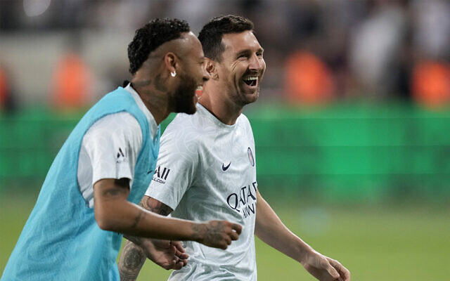 PSG's Neymar, left, with his teammate Lionel Messi, right, prior to the start of a soccer match between Nantes and Paris Saint-Germain at Bloomfield Stadium in Tel Aviv, July 31, 2022. (AP Photo/Ariel Schalit) PSG's Neymar, left, with his teammate Lionel Messi, right, prior to the start of a soccer match between Nantes and Paris Saint-Germain at Bloomfield Stadium in Tel Aviv, July 31, 2022. (AP Photo/Ariel Schalit)