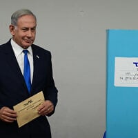 Likud party leader Benjamin Netanyahu casts his vote in the party primaries at a polling station in Tel Aviv, on August 10, 2022. (Tomer Neuberg/Flash90/File)