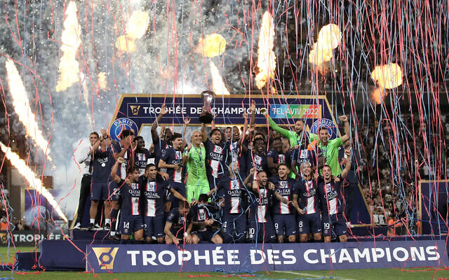 PSG's Marquinhos holds the trophy after winning the French Champions Trophy soccer match between Nantes and Paris Saint-Germain at Bloomfield Stadium in Tel Aviv, July 31, 2022. (AP Photo/Ariel Schalit) PSG's Marquinhos holds the trophy after winning the French Champions Trophy soccer match between Nantes and Paris Saint-Germain at Bloomfield Stadium in Tel Aviv, July 31, 2022. (AP Photo/Ariel Schalit)